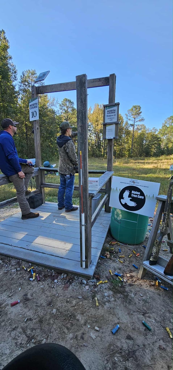Coach and shooter at sporting clays North Course station ten